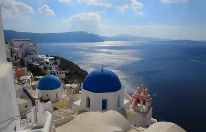 30. Blue domed church in santorini, greece