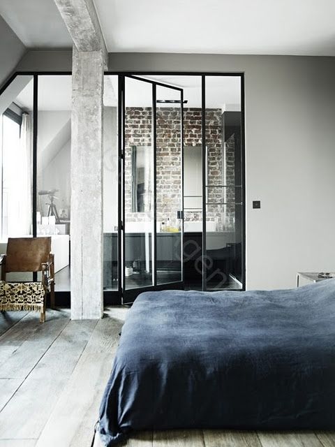 Bedroom with a transparent bathroom