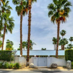 Mid-century house with manicured grounds