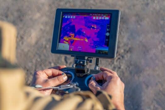 San rafael, argentina, june 12, 2021: firefighter flying drone with thermal camera. Lesser known facts about thermal imaging cameras.