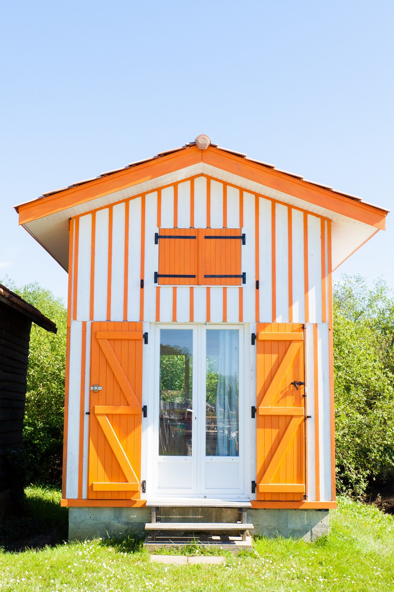 Typique colored wooden houses in biganos port in the bay of arcachon. Garden office sheds.