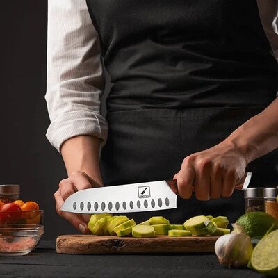 Man cutting fruits using imarku knife