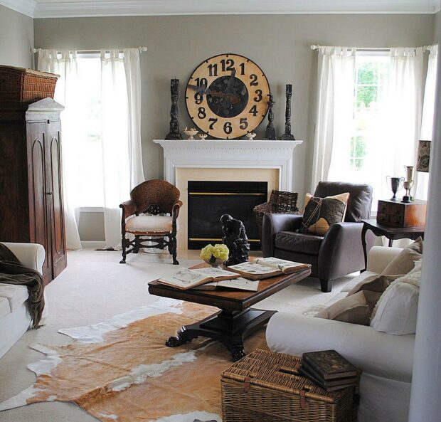 Decorated living area with books and fireplace